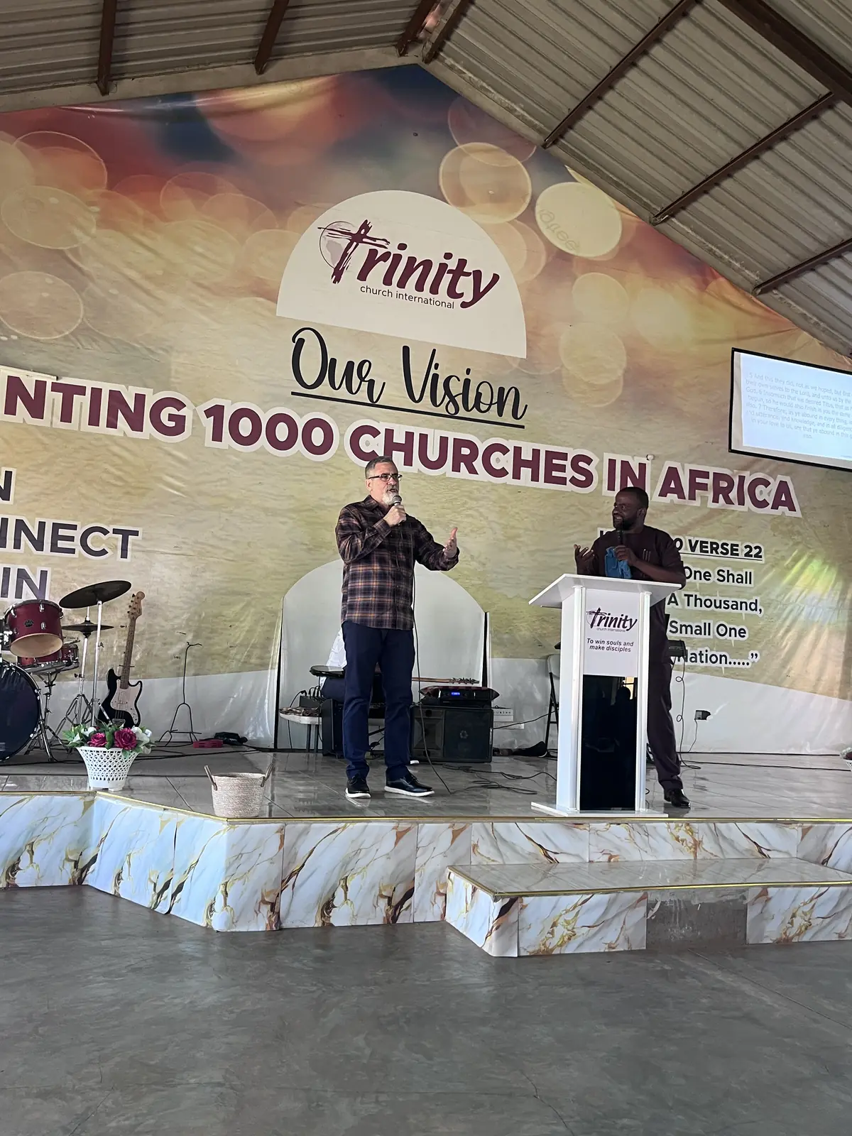 Dino teaching the Sunday morning congregation at Trinity Church International
