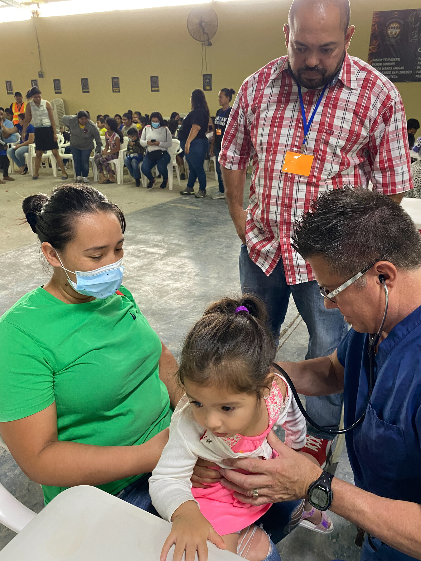 Living Stones team member ministering to a child in Honduras