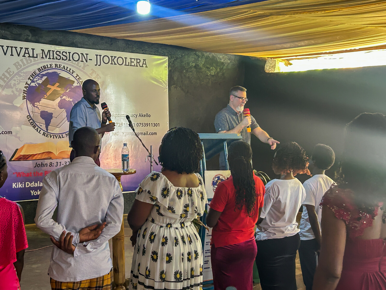 GlobalRoar teaching with interpretation during ministry in Uganda
